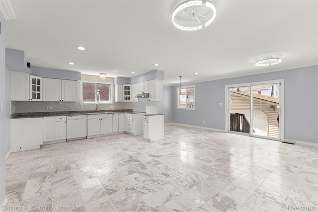7115 Steadman St, Dearborn, MI 48126 - kitchen featuring dishwasher, dark countertops, glass insert cabinets, white cabinetry, and recessed lighting