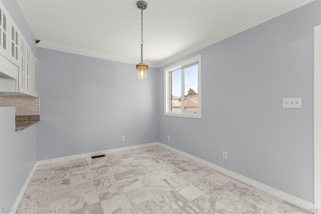 7115 Steadman St, Dearborn, MI 48126 - unfurnished dining area with crown molding and light marble finish flooring