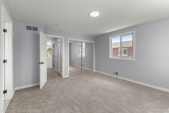 7115 Steadman St, Dearborn, MI 48126 - unfurnished bedroom with carpet floors, multiple windows, and a closet