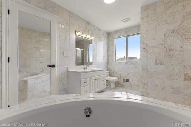 7115 Steadman St, Dearborn, MI 48126 - full bath featuring vanity, a garden tub, and tile walls