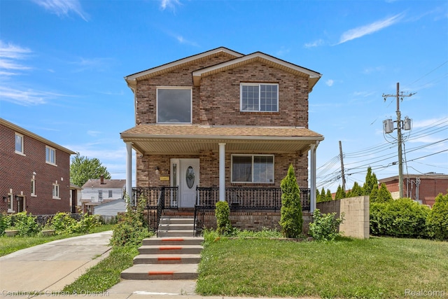 7115 Steadman St, Dearborn, MI 48126 - traditional home with brick siding and covered porch