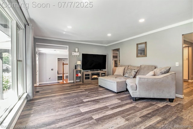 1049 Hillcrest Ave, Brighton, MI 48116 - living area featuring ornamental molding, healthy amount of natural light, wood finished floors, and recessed lighting