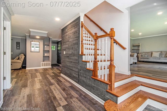 1049 Hillcrest Ave, Brighton, MI 48116 - staircase with wood finished floors, ornamental molding, and recessed lighting