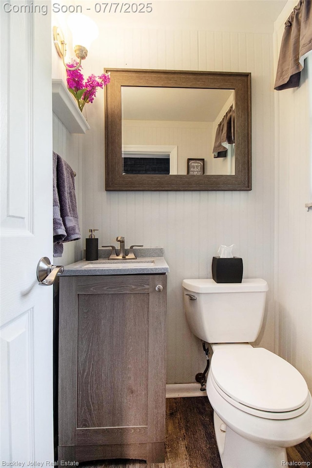 1049 Hillcrest Ave, Brighton, MI 48116 - half bath featuring vanity and wood finished floors