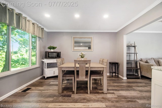 1049 Hillcrest Ave, Brighton, MI 48116 - dining room featuring ornamental molding, dark wood-type flooring, and recessed lighting