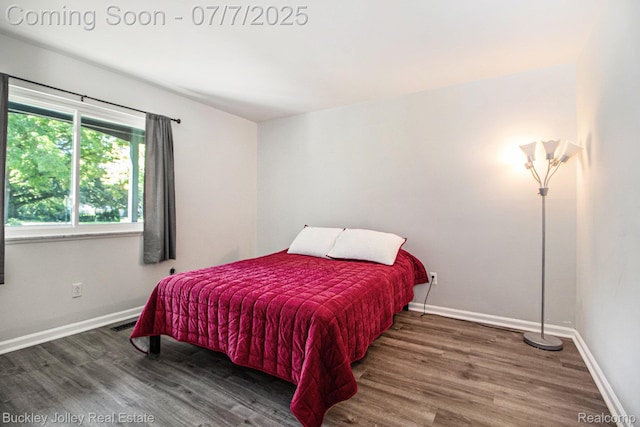 1049 Hillcrest Ave, Brighton, MI 48116 - bedroom with wood finished floors