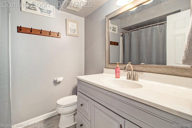 1049 Hillcrest Ave, Brighton, MI 48116 - bathroom featuring toilet and vanity