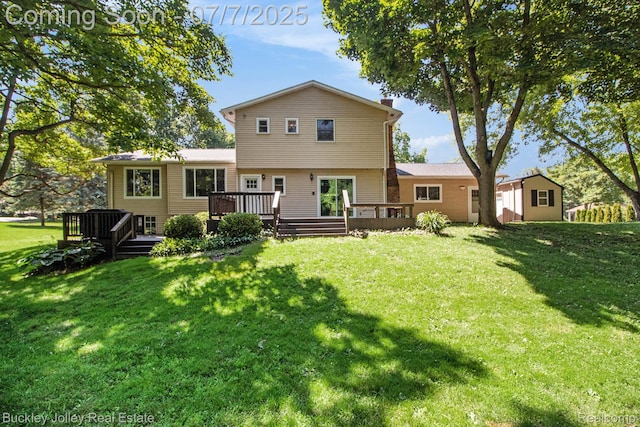 1049 Hillcrest Ave, Brighton, MI 48116 - back of house featuring a deck, a lawn, and a shed