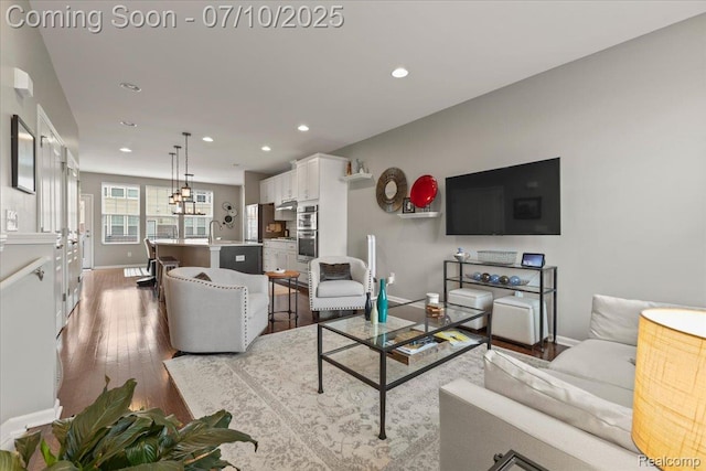 2582 Helmsdale Cir, Rochester, MI 48307 - living area featuring wood finished floors and recessed lighting