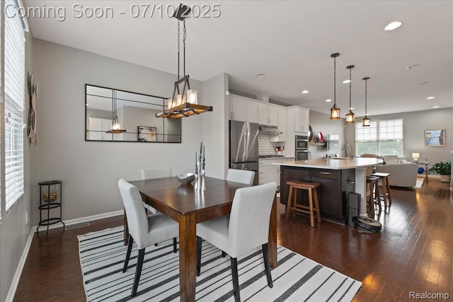 2582 Helmsdale Cir, Rochester, MI 48307 - dining room with dark wood-type flooring and recessed lighting