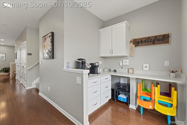 2582 Helmsdale Cir, Rochester, MI 48307 - kitchen with dark wood-type flooring, white cabinetry, and light countertops