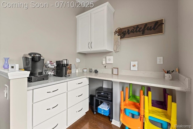 2582 Helmsdale Cir, Rochester, MI 48307 - kitchen with light countertops, white cabinets, and dark wood-style floors