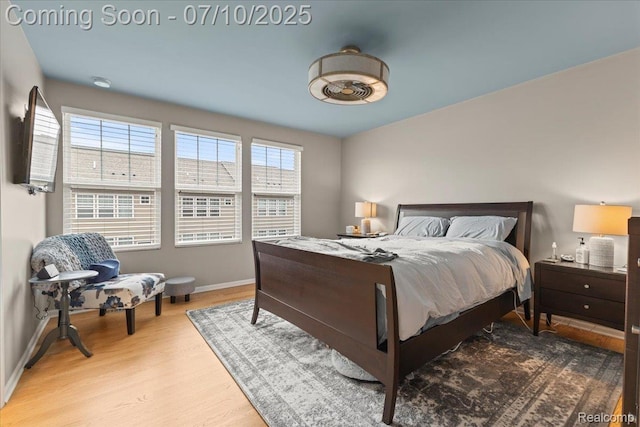 2582 Helmsdale Cir, Rochester, MI 48307 - bedroom featuring baseboards and wood finished floors