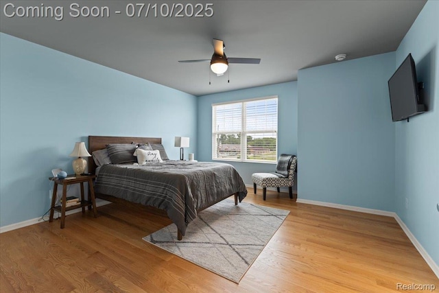 2582 Helmsdale Cir, Rochester, MI 48307 - bedroom with wood finished floors and ceiling fan