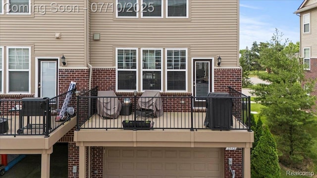 2582 Helmsdale Cir, Rochester, MI 48307 - rear view of property with brick siding, an attached garage, and a balcony