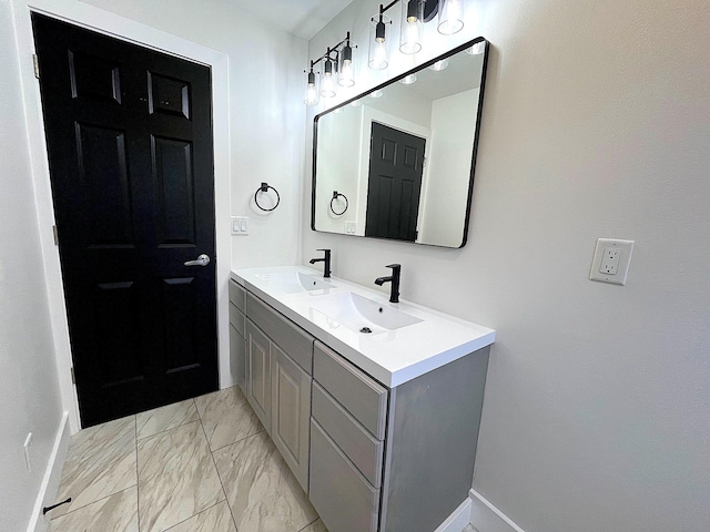 838 Meadow Dr, Traverse City, MI 49685 - bathroom with double vanity and marble finish flooring