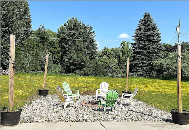 838 Meadow Dr, Traverse City, MI 49685 - view of patio featuring an outdoor fire pit