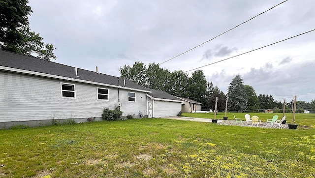838 Meadow Dr, Traverse City, MI 49685 - view of green lawn featuring a patio