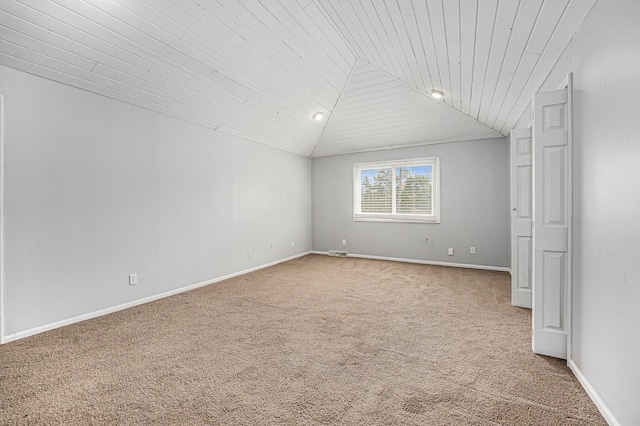 5643 Ivanrest Ave SW, Wyoming, MI 49418 - empty room with vaulted ceiling, light carpet, and wood ceiling