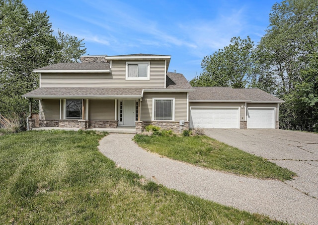 5643 Ivanrest Ave SW, Wyoming, MI 49418 - view of front facade featuring stone siding, a garage, driveway, and a front yard