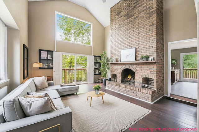 5643 Ivanrest Ave SW, Wyoming, MI 49418 - living room with high vaulted ceiling, a fireplace, and hardwood / wood-style floors