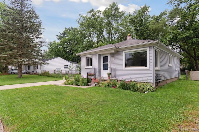 14634 Mcguire St, Taylor, MI 48180 - view of front of house featuring a chimney