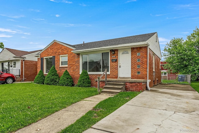 808 Pagel Ave, Lincoln Park, MI 48146 - view of front of home with brick siding and concrete driveway