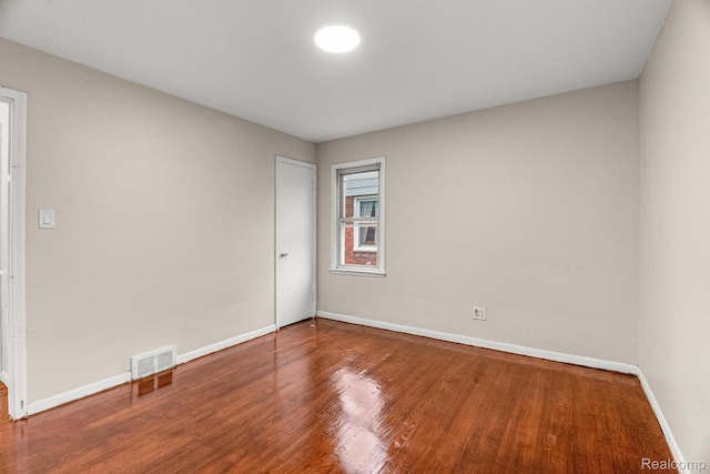 808 Pagel Ave, Lincoln Park, MI 48146 - empty room featuring wood finished floors and baseboards