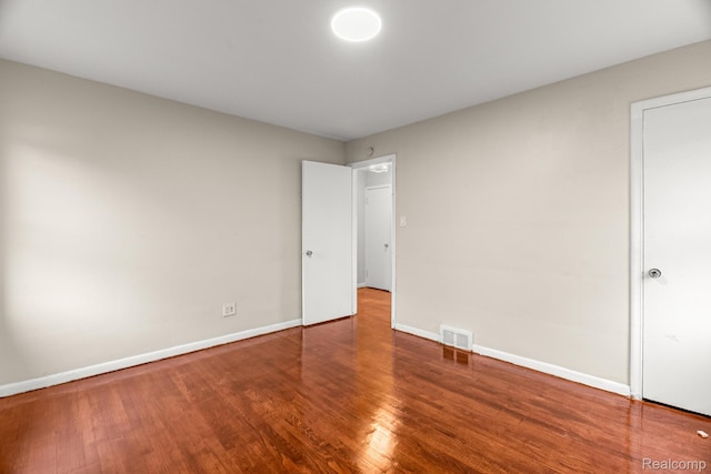 808 Pagel Ave, Lincoln Park, MI 48146 - unfurnished bedroom featuring wood finished floors and baseboards