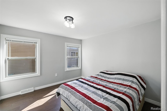 17652 Robert St, Melvindale, MI 48122 - bedroom featuring wood finished floors and baseboards