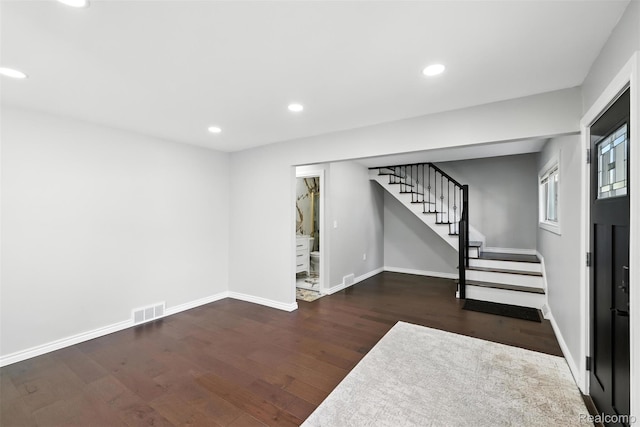 17652 Robert St, Melvindale, MI 48122 - below grade area featuring stairs, wood finished floors, and recessed lighting