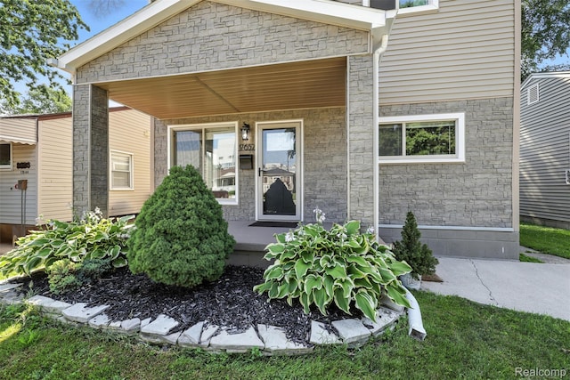 17652 Robert St, Melvindale, MI 48122 - view of exterior entry with stone siding and covered porch