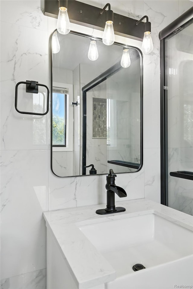 17652 Robert St, Melvindale, MI 48122 - bathroom with a marble finish shower and vanity