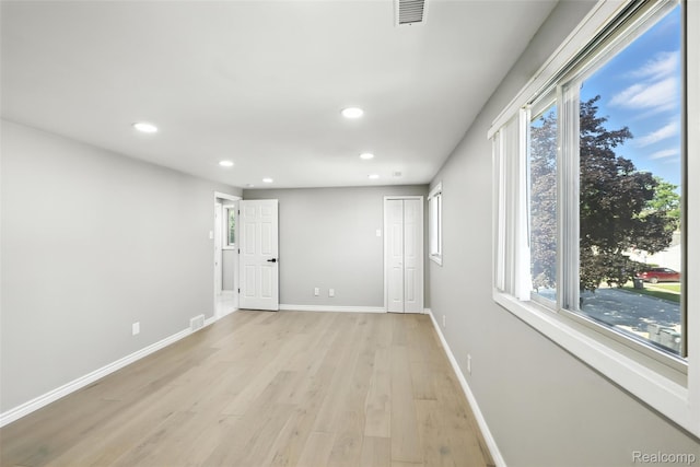 17652 Robert St, Melvindale, MI 48122 - spare room featuring recessed lighting, light wood-style flooring, and plenty of natural light