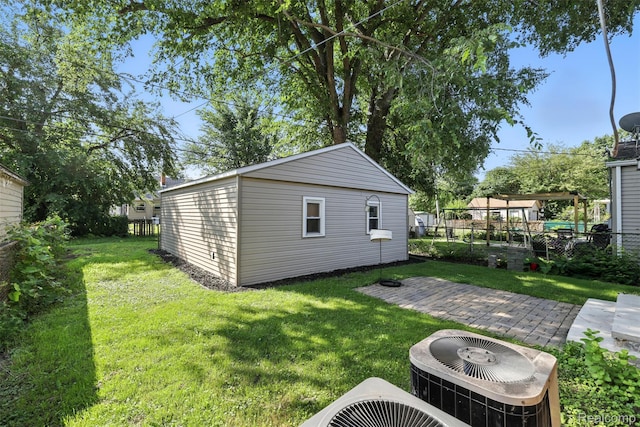 17652 Robert St, Melvindale, MI 48122 - view of yard featuring an outdoor structure and a patio