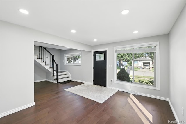 17652 Robert St, Melvindale, MI 48122 - entrance foyer featuring healthy amount of natural light, stairway, dark wood-style floors, and recessed lighting
