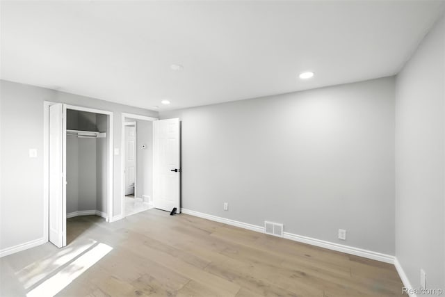 17652 Robert St, Melvindale, MI 48122 - unfurnished bedroom featuring recessed lighting, light wood-style flooring, and a closet