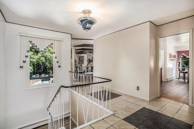 3706 Northview Dr, Kalamazoo, MI 49004 - hall featuring an upstairs landing, baseboard heating, tile patterned floors, and healthy amount of natural light