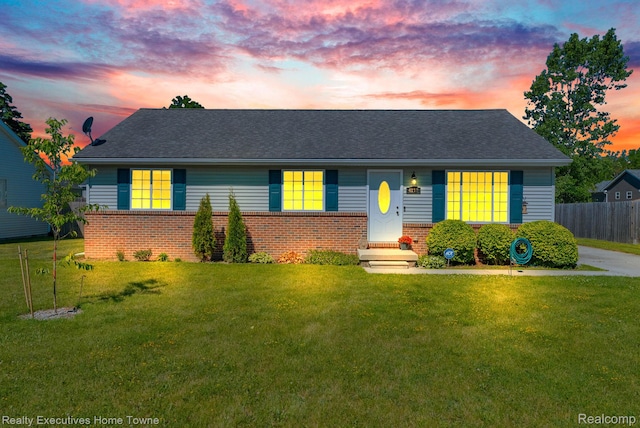 4217 Tristen Ave, Fort Gratiot, MI 48059 - view of front of house featuring brick siding and roof with shingles