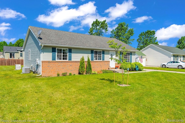 4217 Tristen Ave, Fort Gratiot, MI 48059 - view of front of house featuring brick siding and roof with shingles