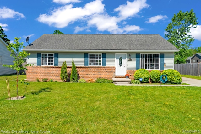 4217 Tristen Ave, Fort Gratiot, MI 48059 - view of front facade with brick siding and a shingled roof