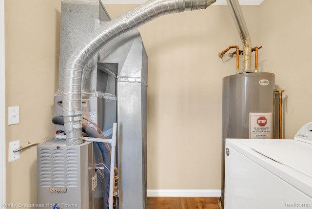4217 Tristen Ave, Fort Gratiot, MI 48059 - utility room with washer / dryer and electric water heater