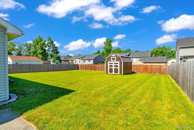 4217 Tristen Ave, Fort Gratiot, MI 48059 - fenced backyard featuring a storage shed and a residential view