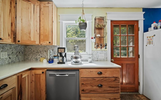 519 Hanover St, Concord, MI 49237 - kitchen featuring dishwasher, freestanding refrigerator, tasteful backsplash, and light countertops