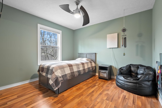 5643 E C Ave, Richland, MI 49083 - bedroom featuring wood finished floors and ceiling fan