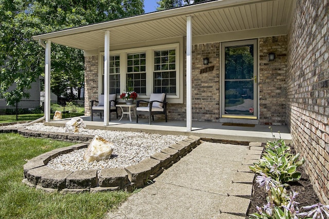 7981 Faircrest Dr, Ypsilanti, MI 48197 - entrance to property featuring covered porch and brick siding