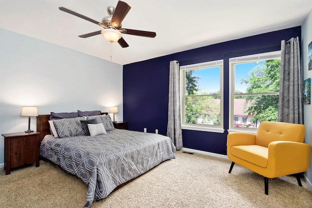 7981 Faircrest Dr, Ypsilanti, MI 48197 - carpeted bedroom with baseboards and a ceiling fan
