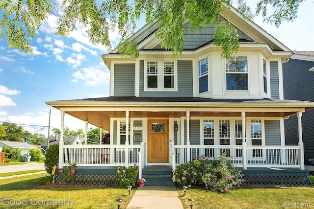 2340 Hamata St, Ferndale, MI 48220 - view of front of house with covered porch and a front lawn