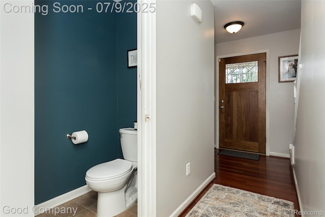 2340 Hamata St, Ferndale, MI 48220 - bathroom featuring baseboards and wood finished floors