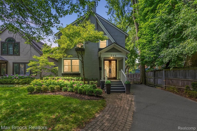 504 Landon St, Birmingham, MI 48009 - view of front of property with a chimney
